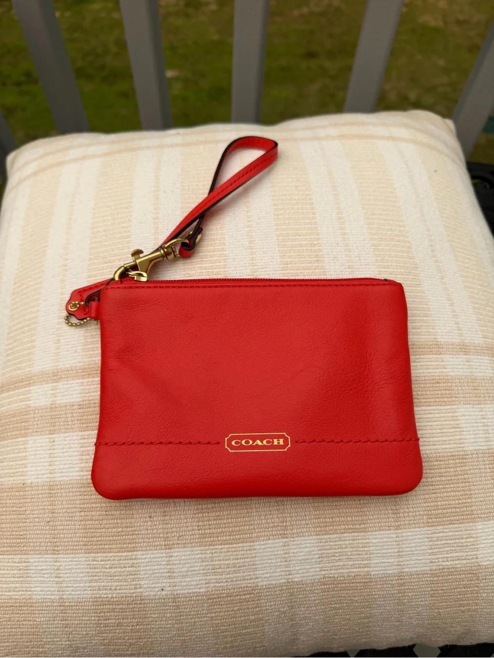 COACH Vintage Orange Glovetanned Leather Wristlet Pouch